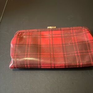 Latico magnetic red and black clutch purse.